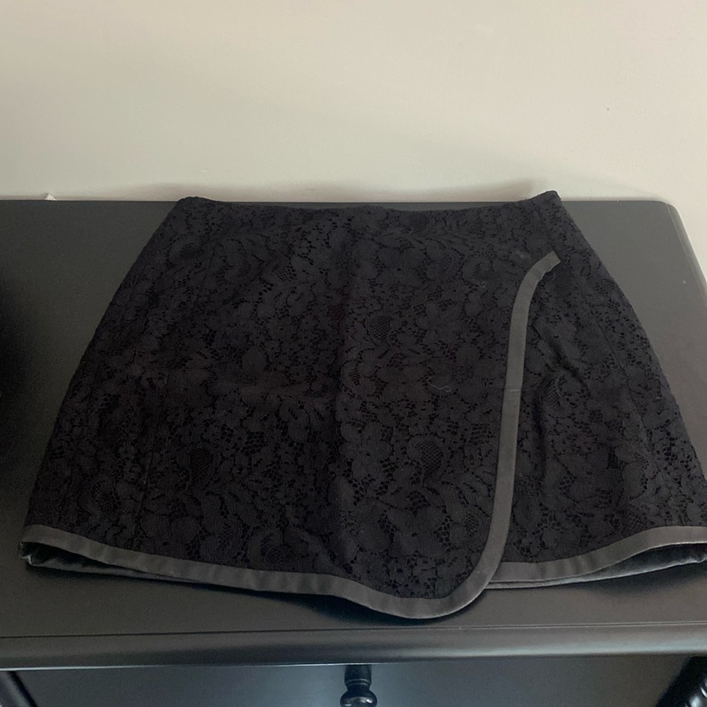 Rebecca Taylor black lace mini skirt w/ leather trim. Great condition.